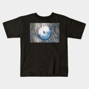 Winter landscape of round lake with island in the middle Kids T-Shirt